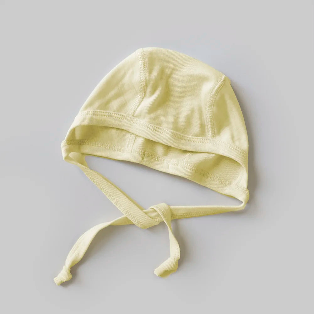 Babyhäubchen/Bonnet Merino - Butter Yellow