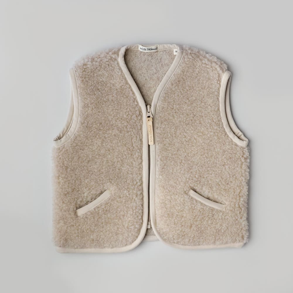 Kuschelige Weste aus 100% Bio-Schurwolle in Beige/Beige für Kinder und Damen.